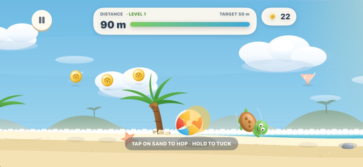Shelly bouncing along the beach past coins and a beach ball